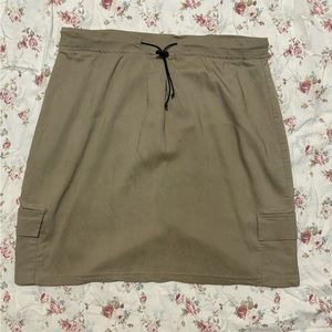 stretchy light brown skirt, with pockets.